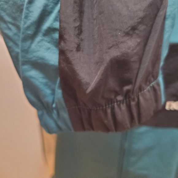 NWOT New Balance Athletics Windbreaker Mountain Teal Jacket - Picture 12 of 12